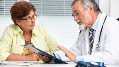 a doctor talking to a patient