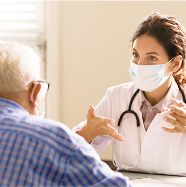 A doctor talking to her patient